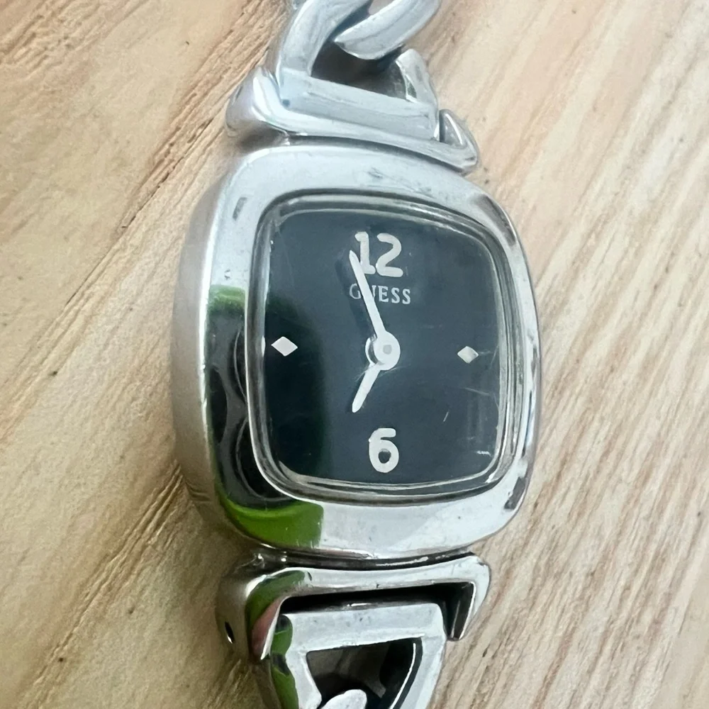 Guess ladies rectangular black dial silver tone  bracelet watch NEW BATTERY
